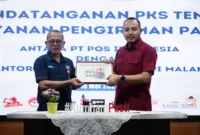 Dinas Imigrasi Malang bekerjasama dengan PT Pos Indonesia. (foto: humas kemenkumham jatim)