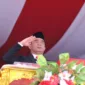 Menko PMK Muhadjir Effendy menjadi inspektur upacara dalam rangka memperingati HUT ke-79 Republik Indonesia di Kota Tual, Provinsi Maluku, pada Sabtu (17/8/2024).