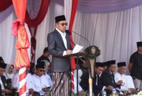 Ketua DPRD Kabupaten Sidoarjo, H. Abdillah Nasih saat berikan sambutan di peringatan Hari Santri Nasional (HSN) tahun 2025. 