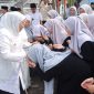 Ribuan santri dari Pondok Pesantren mengikuti Apel Peringatan Hari Santri Provinsi Jawa Timur Tahun 2025 yang digelar di Pondok Pesantren Putri An Nur II Al Murtadlo, Kabupaten Malang, Rabu (22/10/2025). 