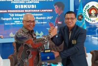Ketua PWI Pusat Akhmad Munir bersama Ketua PWI Lampung Wirahadinumah