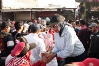 Ribuan warga mengikuti Gebyar Jalan Sehat di Desa Pabean, Kecamatan Sedati, Kabupaten Sidoarjo, Minggu (6/9/2026).