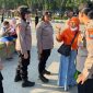 Polisi Wanita (Polwan) Polresta Sidoarjo menggelar patroli dan pengamanan Car Free Day (CFD) di kawasan Alun-Alun Sidoarjo, Minggu (13/9/2026).